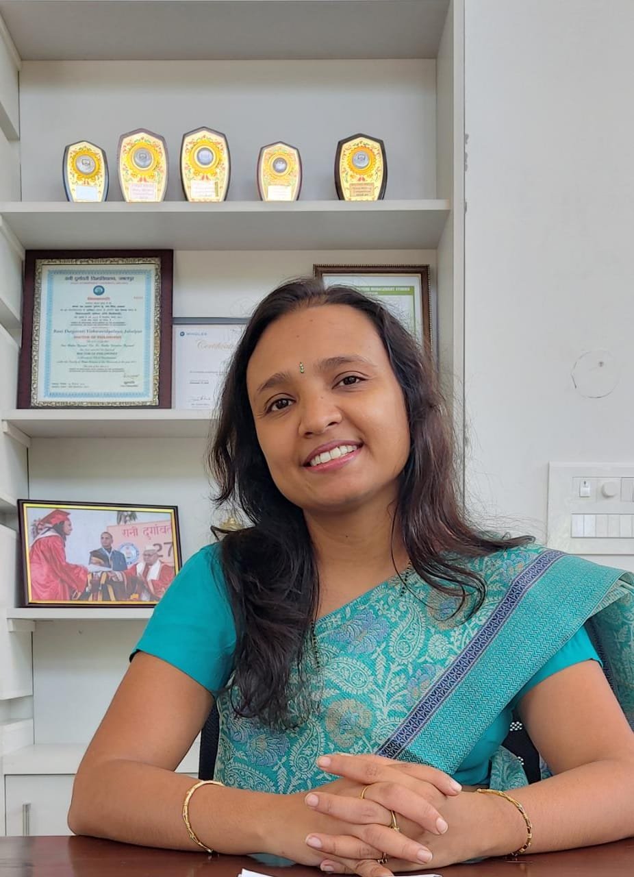 Dr. Radha