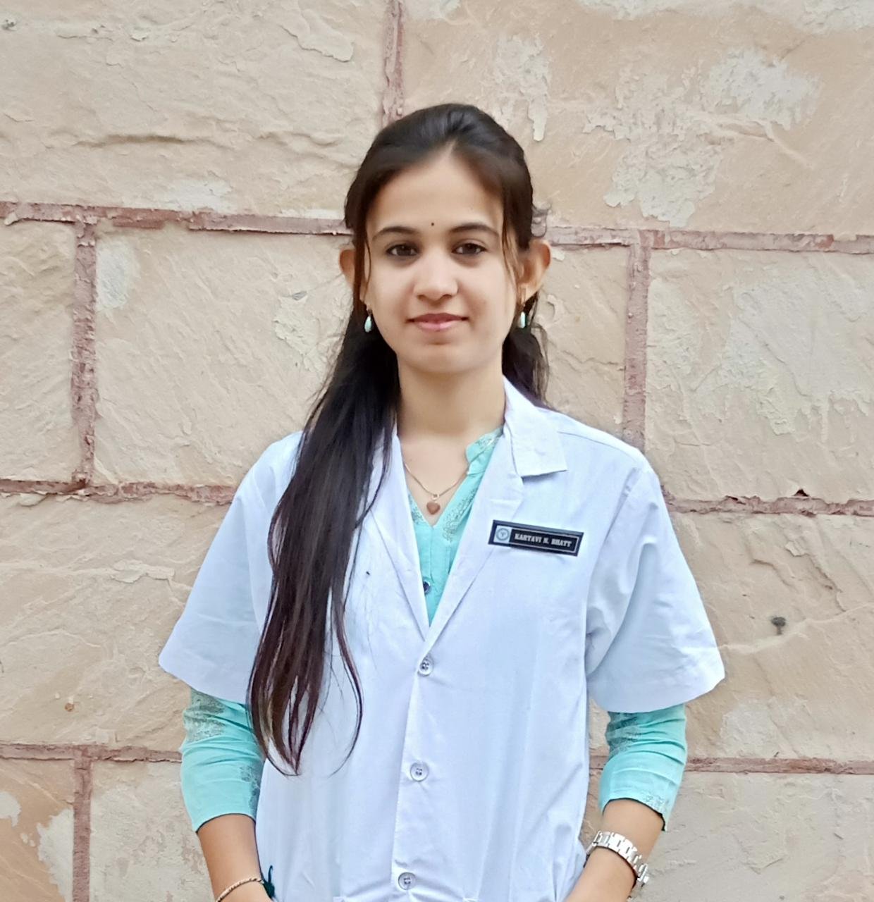 Dr. Kartavi